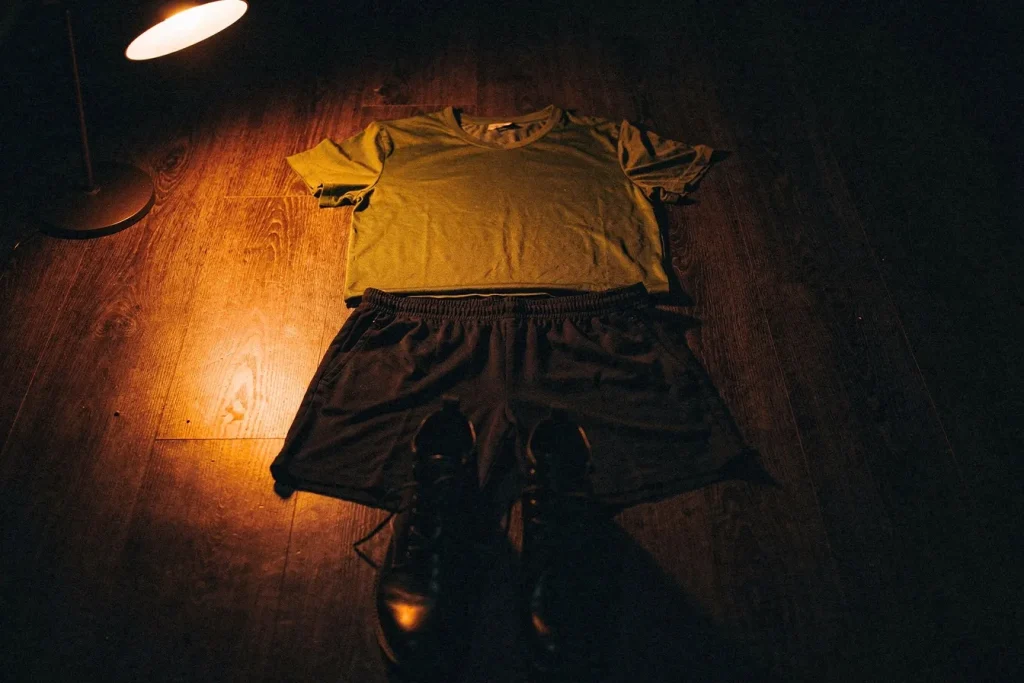 Workout clothes and boots laid out the night before training